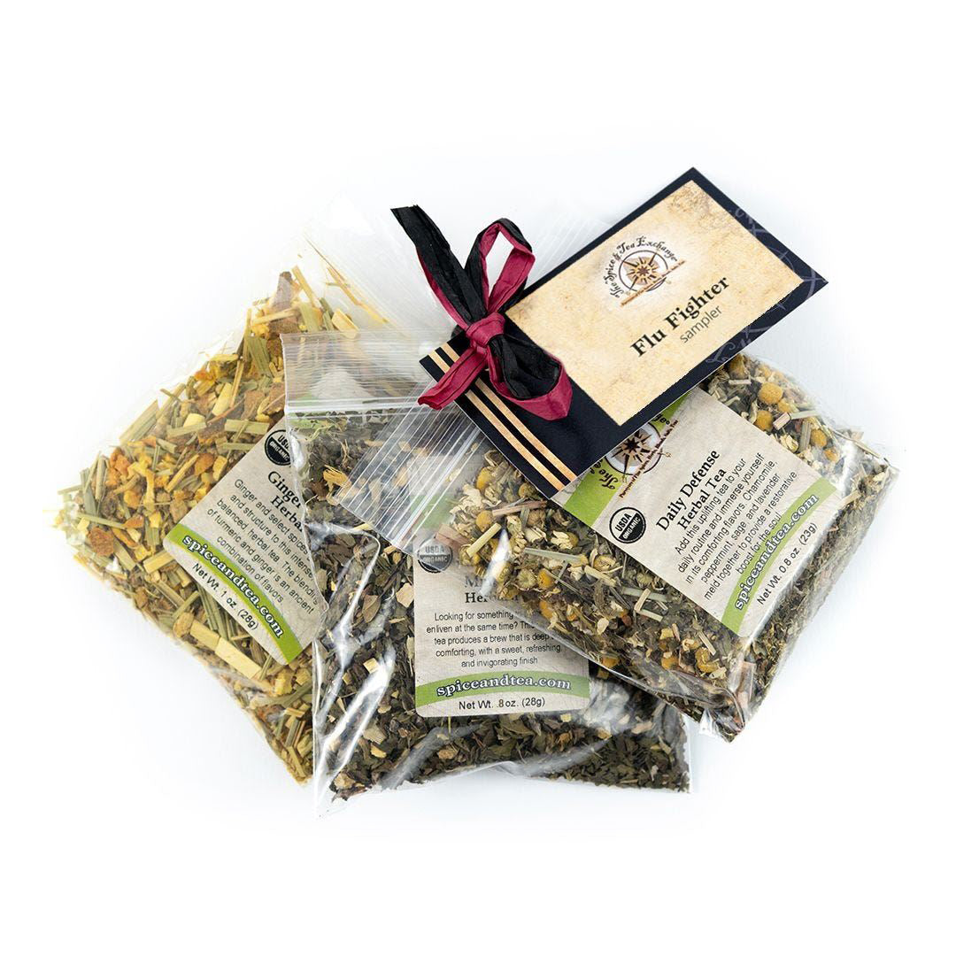 Three herbal tea mixes 'Daily Defense', 'Ginger Turmeric', and 'Mint Basil'. There is a card with 'Flu Fighter' text.